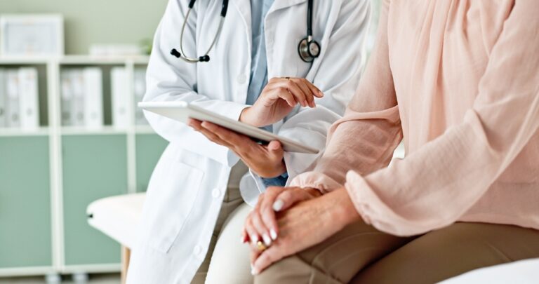 Clinic,,Tablet,And,Hands,Of,Doctor,With,Patient,For,Consulting,